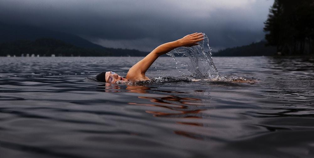 A person swimming in open water